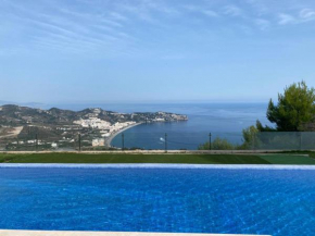 Half of the luxury villa with sea view and pool in natural park, La Herradura